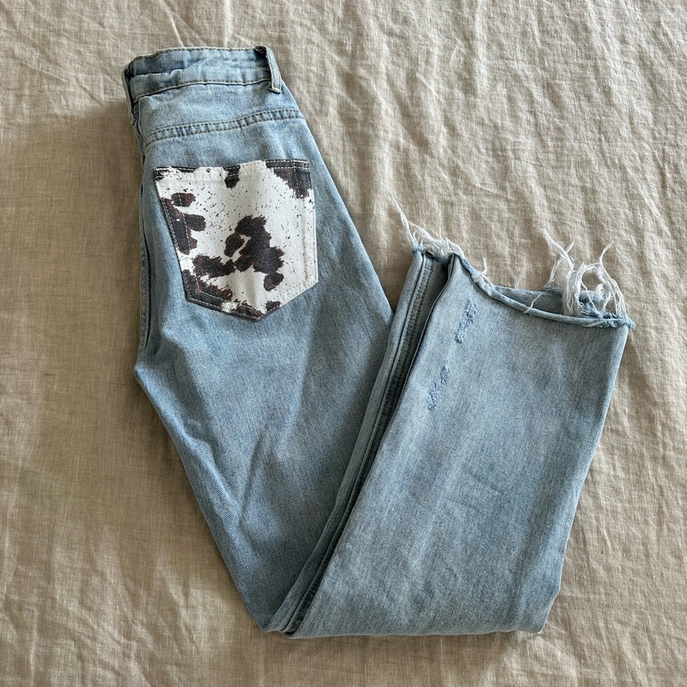 adika cow-print pocket jeans